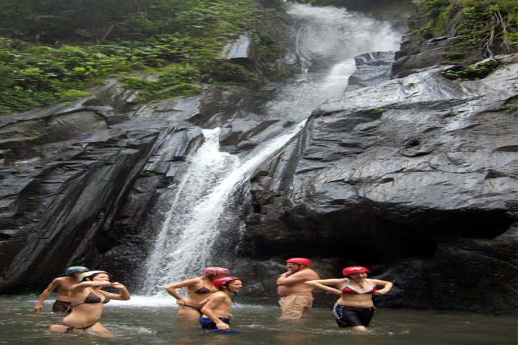 Hidden waterfall along the Ayung River canyon