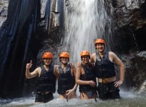 ayung rafting under waterfall
