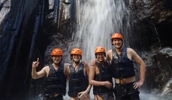 ayung rafting under waterfall