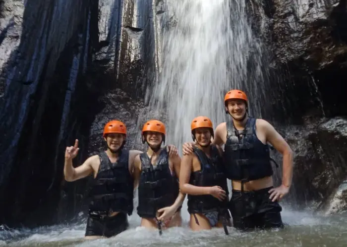 ayung rafting under waterfall